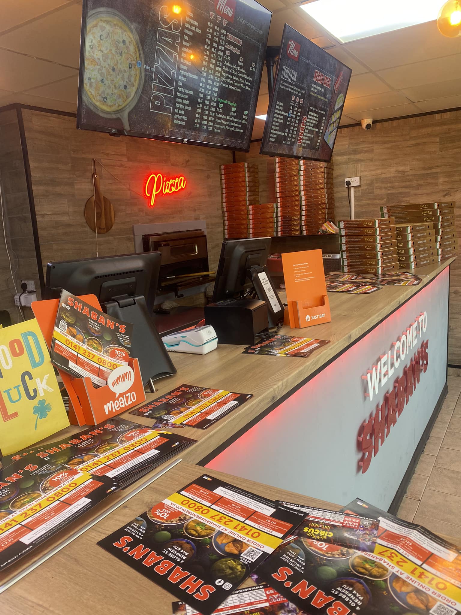 interior of Shaban’s Renfrew, featuring a clean takeaway counter, digital menu boards