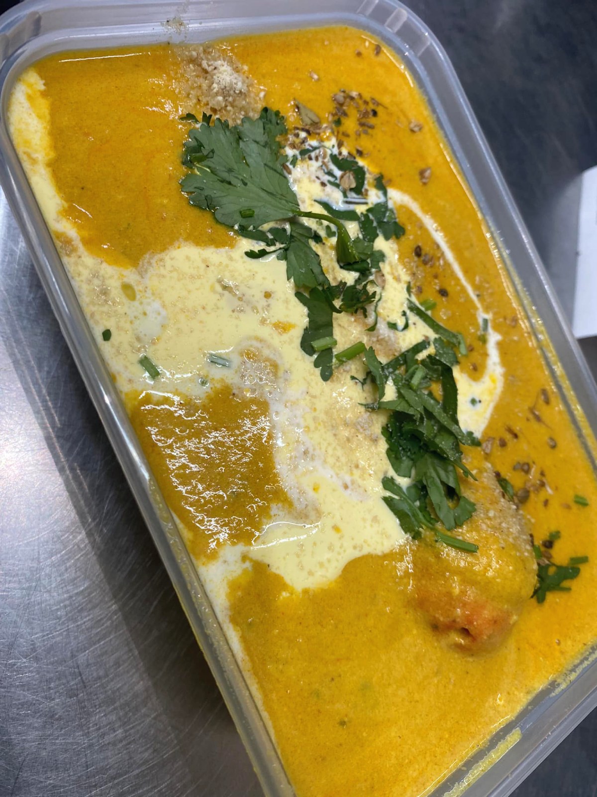 Creamy Korma with spices in dish served at Shaban's Renfrew Takeaway
